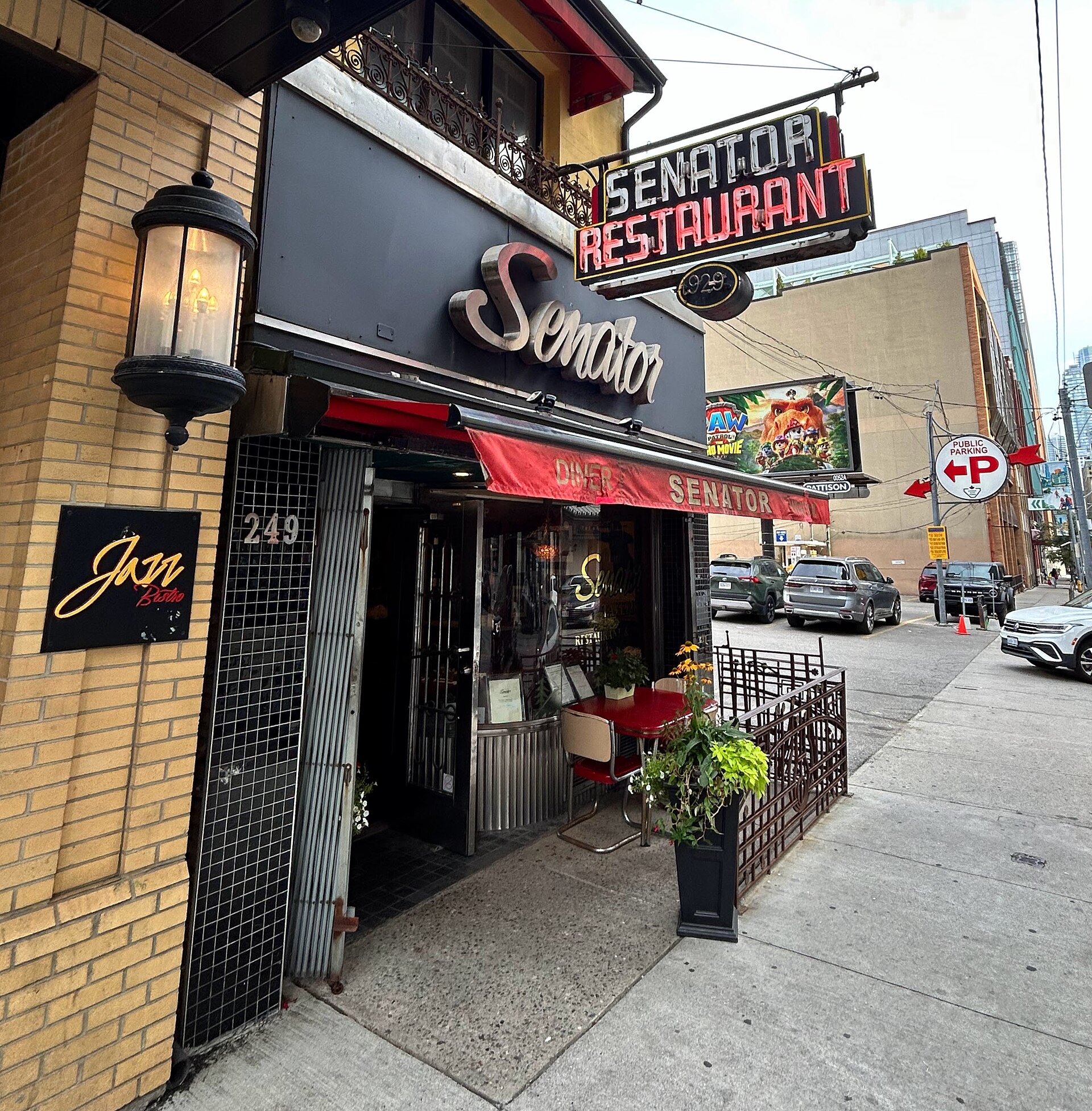 The Senator Restaurant neon sign and storefront Victoria Street Toronto