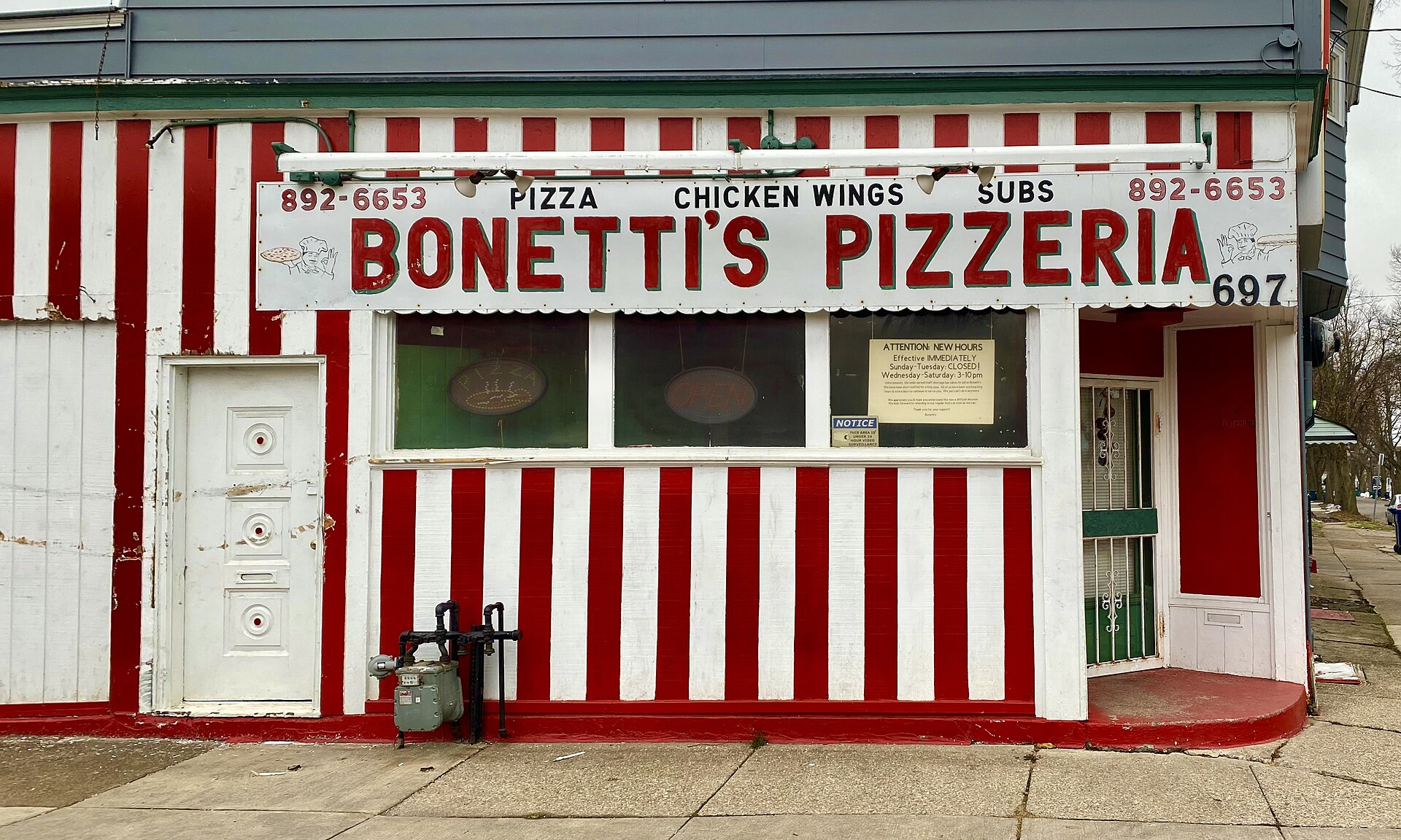 Brightly colored Bonetti's Pizzeria storefront, Walden Avenue, Buffalo, New York   20230110