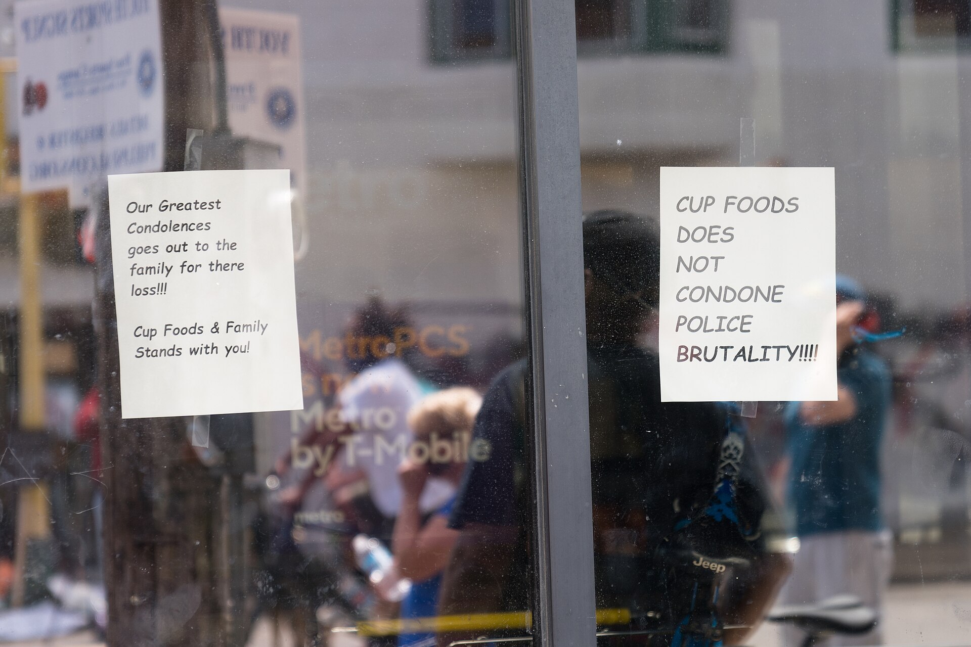 Signs in the storefront windows of Cup Foods at 38th St and S. Chicago Avenue in Minneapolis, where George Floyd died on Monday night in Minneapolis, Minnesota (49943880492)